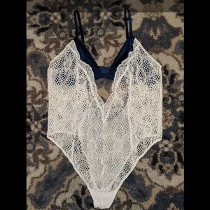 Navy and lacw body suit